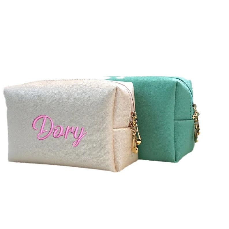 PU Embroidery Hand-held Cosmetic Bag
